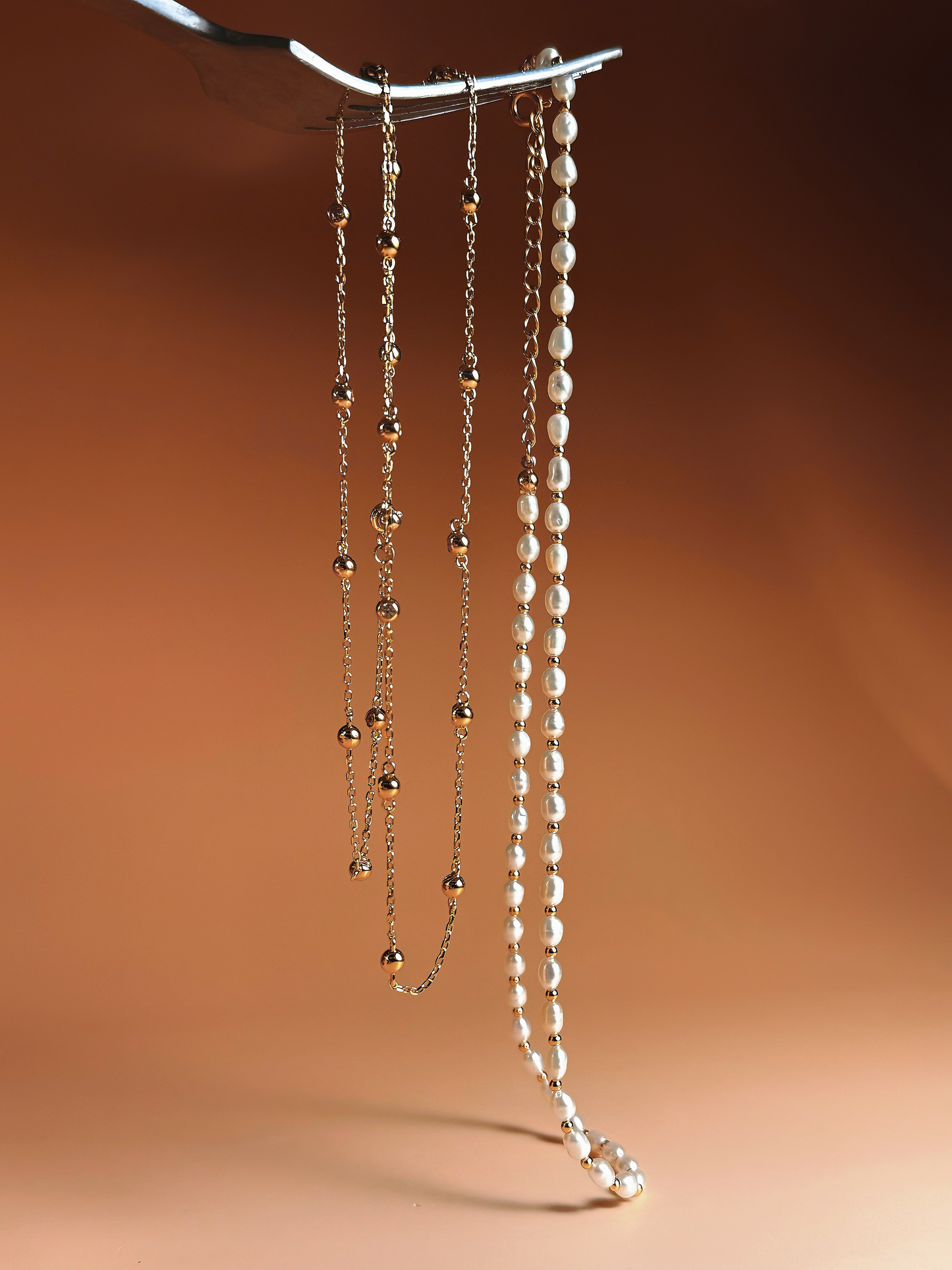Collana di perla e aurea