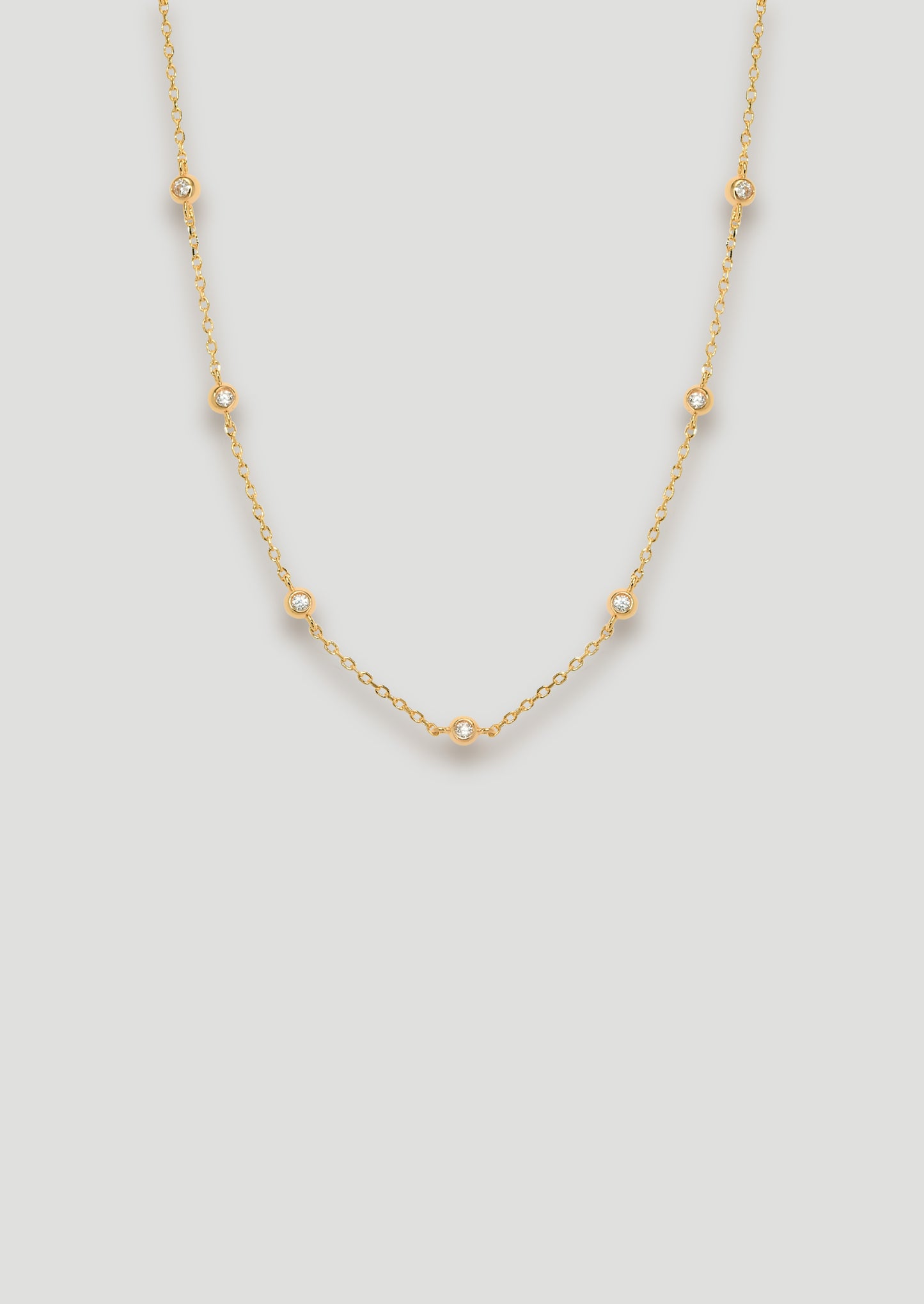 Collana con perline di zirconi dorati
